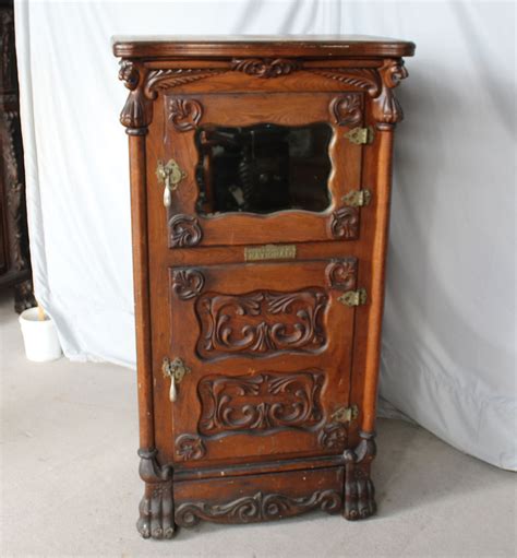 old-fashioned metal ice box|19th century ice box.